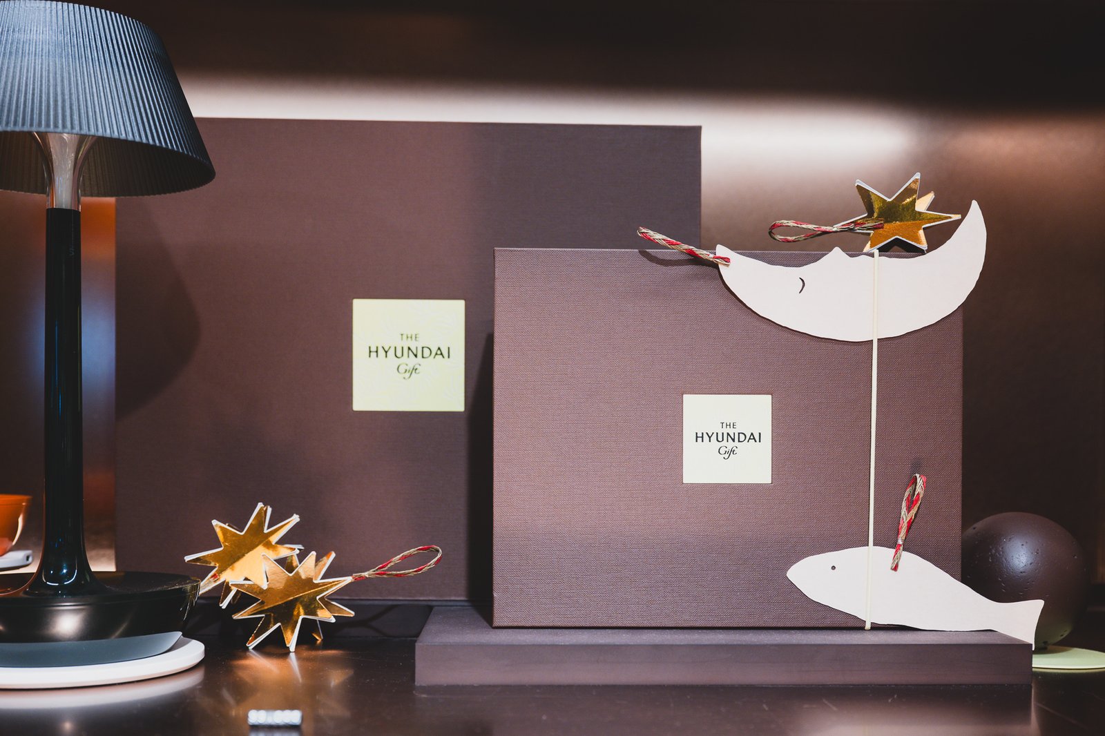 The Hyundai Gift's signature gift box with gold foil ornament decorations
