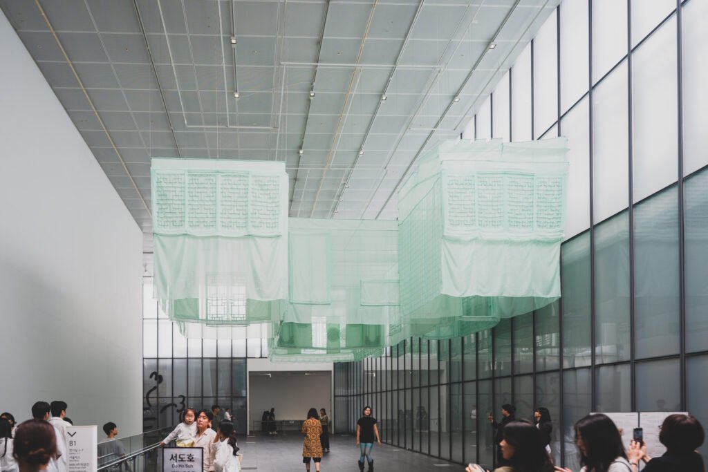 Fabric hanok ceiling installation in the museum lobby, visible without a ticket
