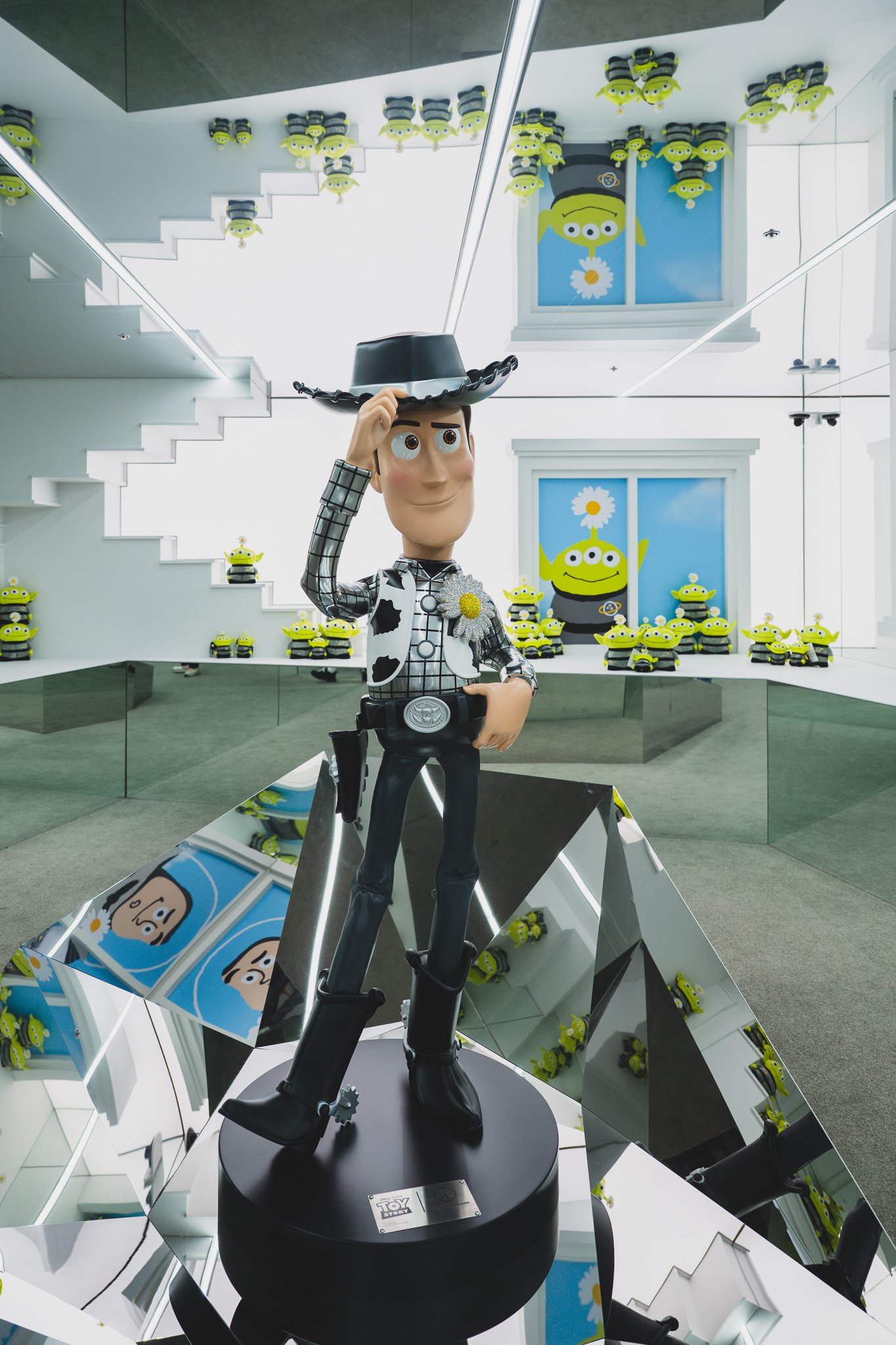 Life-size Woody statue inside a Toy Story x PEACEMINUSONE pop-up store in Seongsu-dong