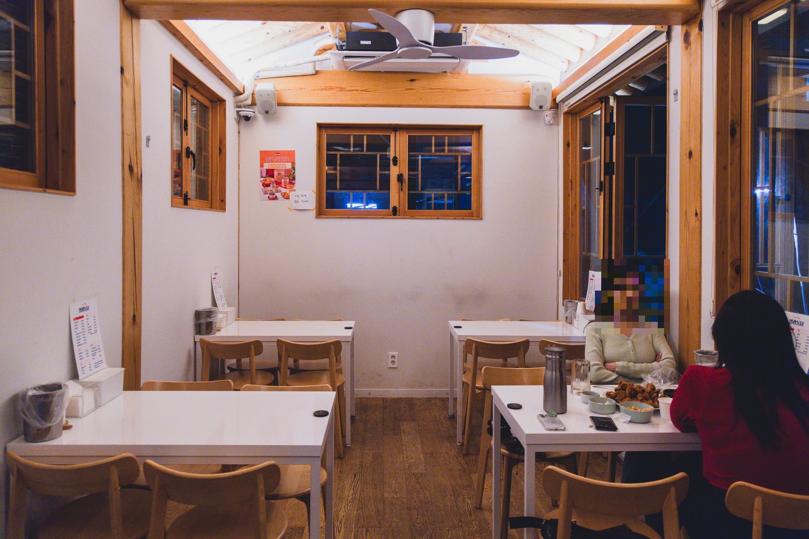 Interior view of the dining room with more diners seated