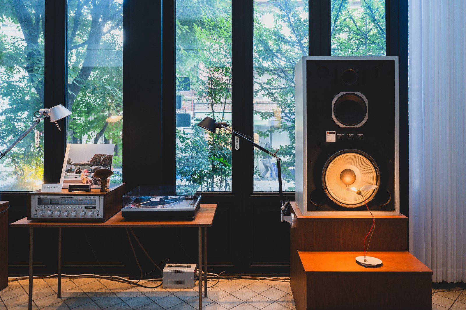 Vintage Marantz receiver, turntable, and a JBL vintage speaker roughly torso-sized
