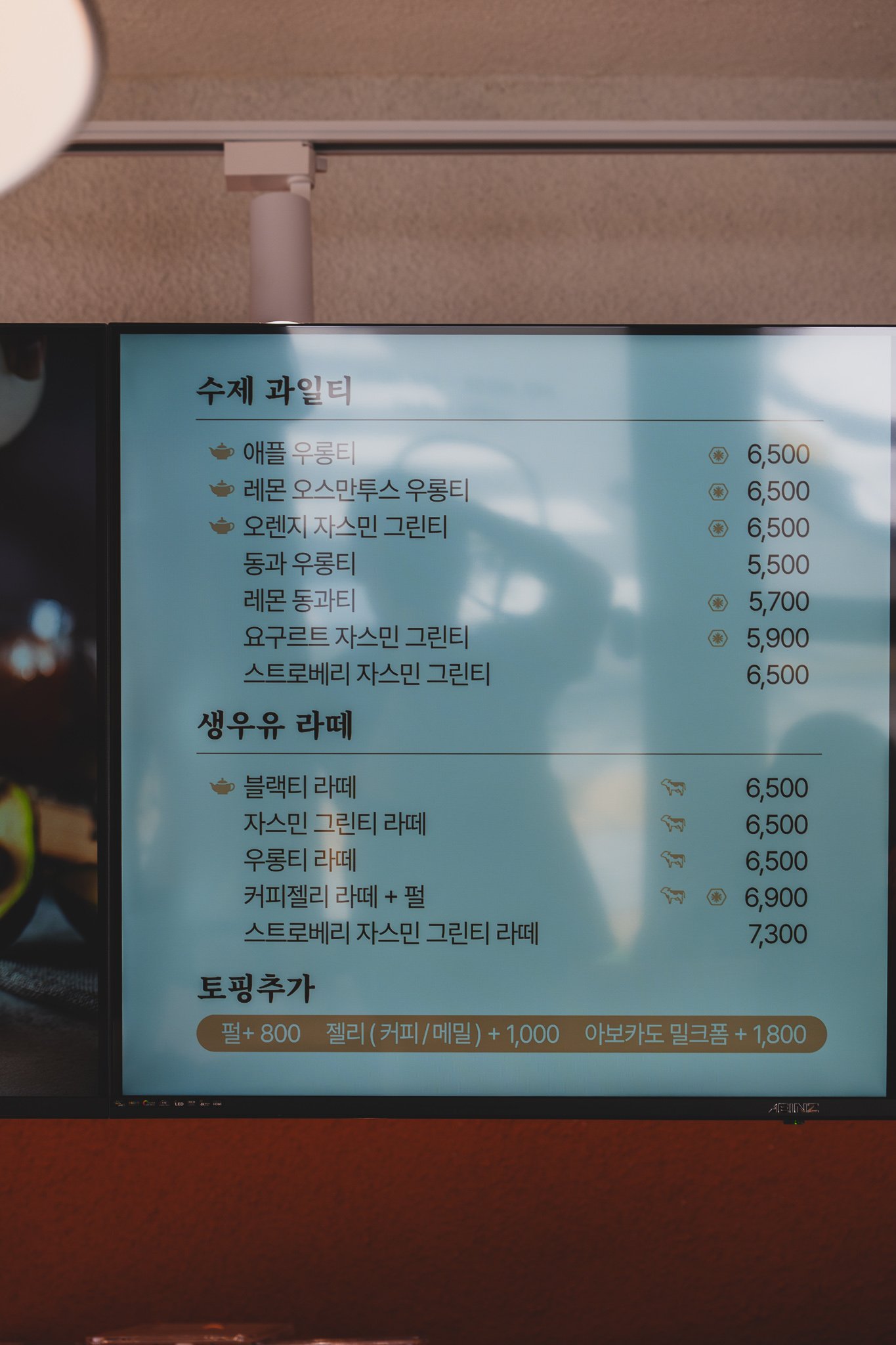 Handmade fruit tea, fresh milk latte, and topping add-on menu