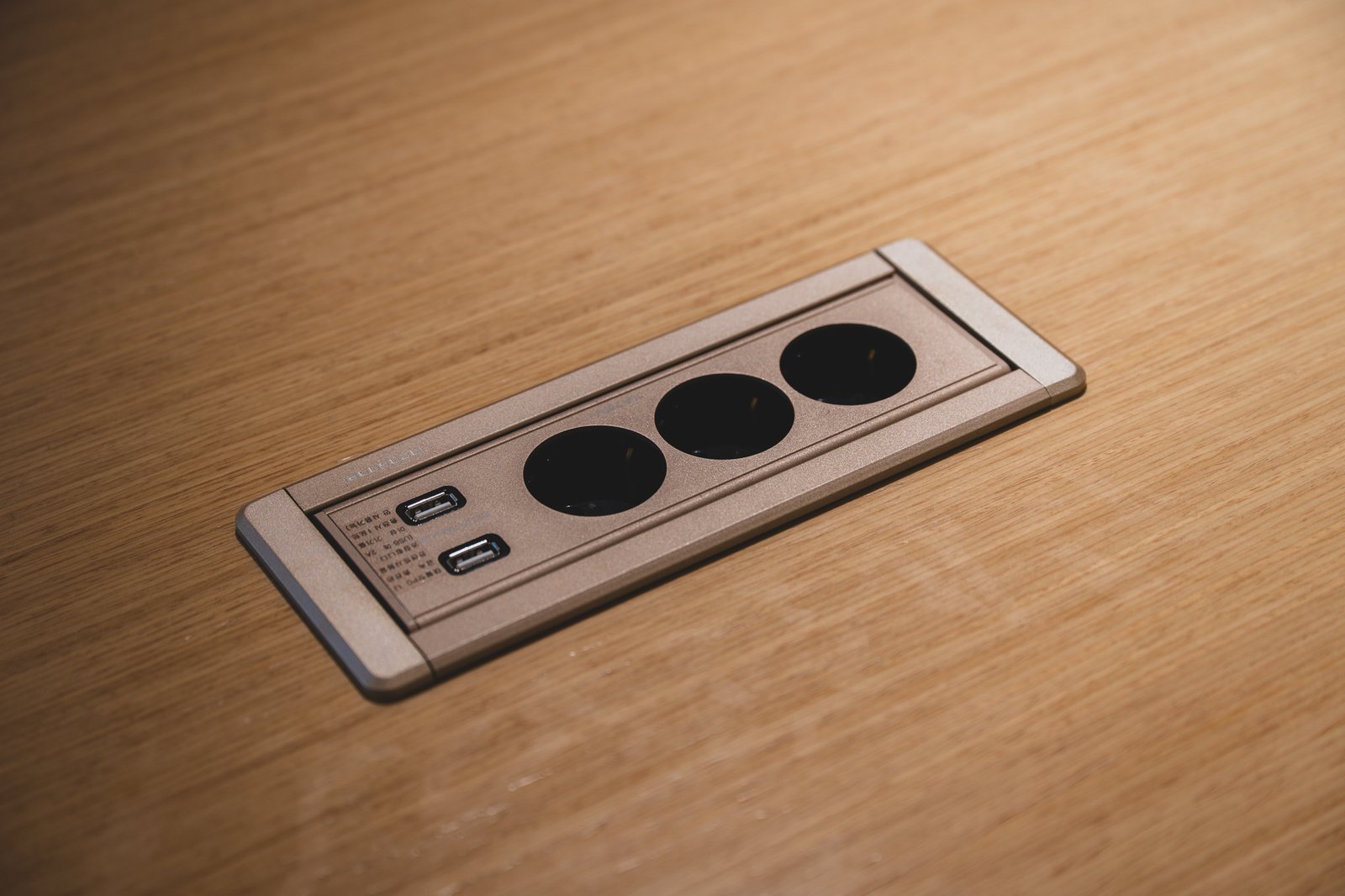 Table with a built-in power outlet and USB port