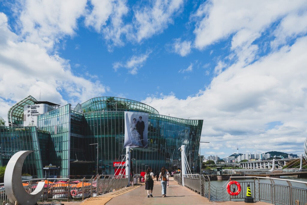 Bridge leading to Sevit Island, with the curved glass building visible in the distance