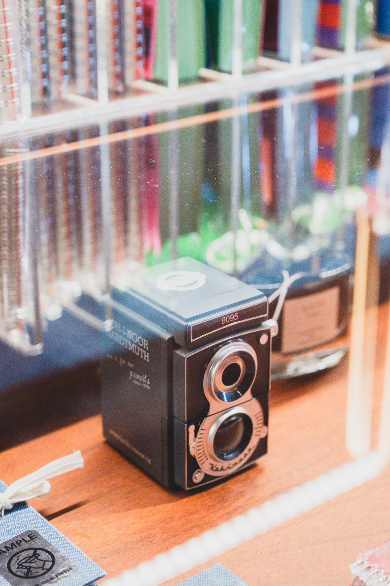 Koh-i-noor Hardtmuth pencil sharpener shaped like a vintage twin-lens reflex camera