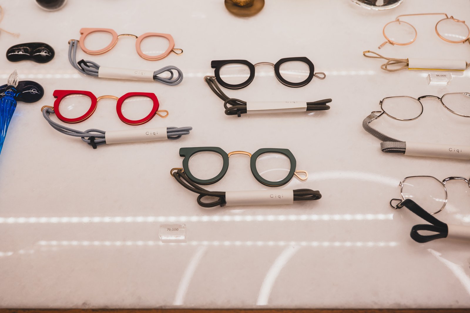 Ciqi brand round reading glasses in pink, red, green, and clear, priced at 79,000 KRW