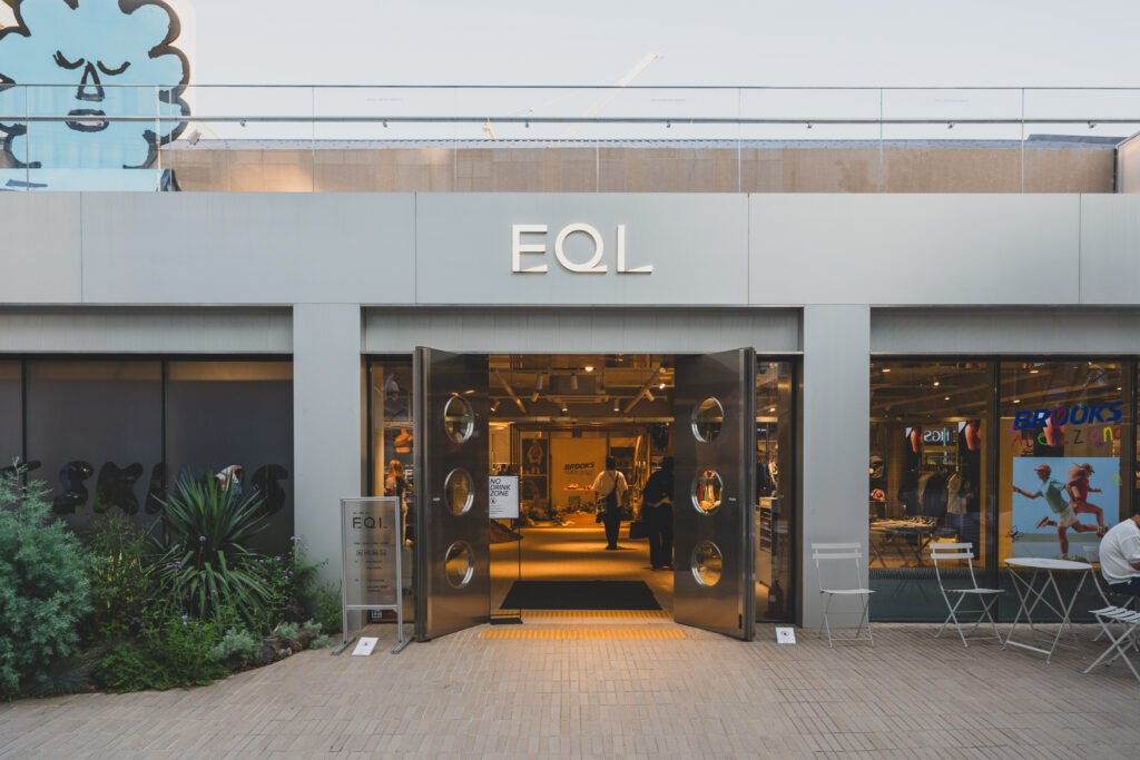 EQL Seongsu storefront with the Brooks x Alex Zono graphic on the window display