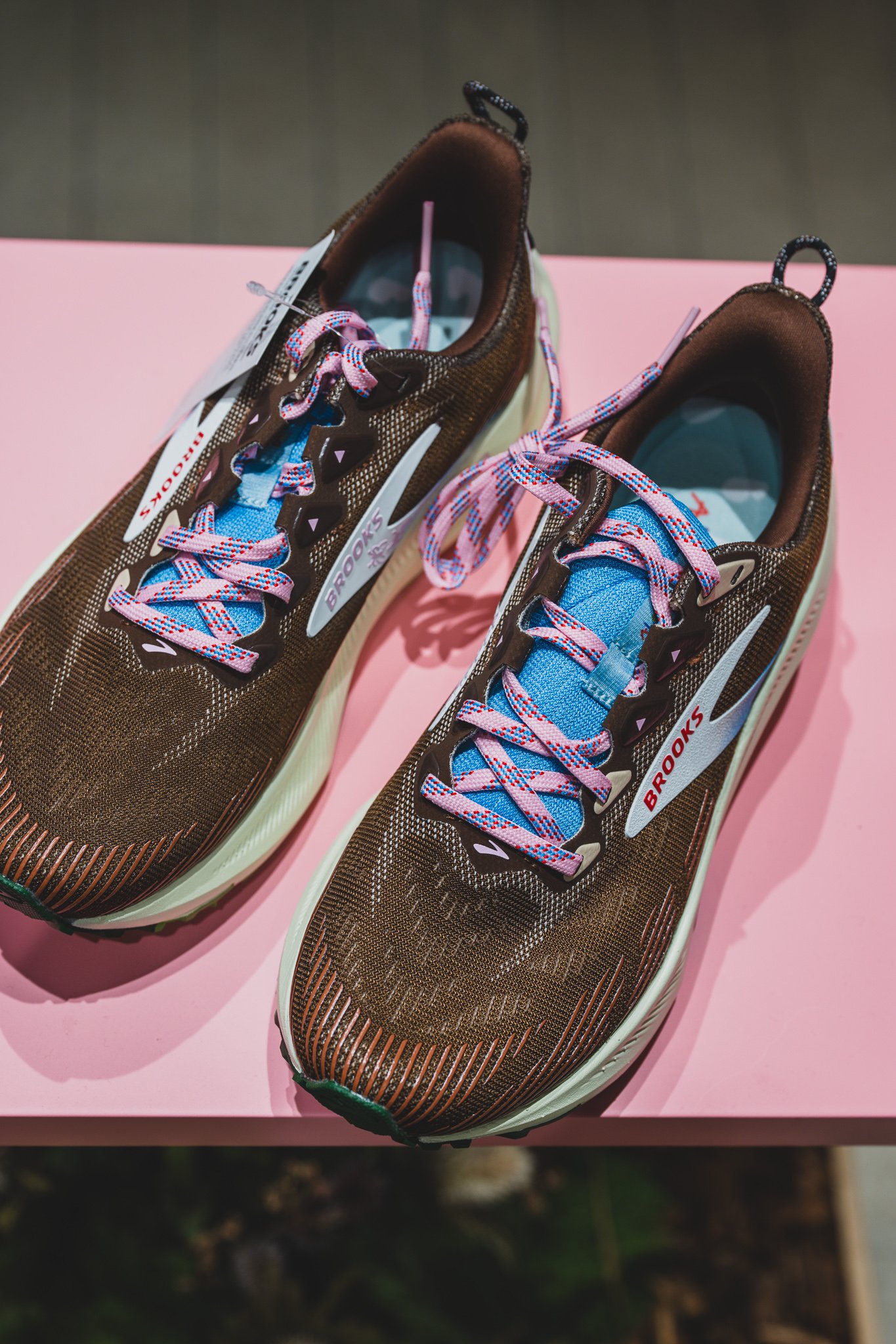 Top-down view of the second shoe with sky-blue lining and crossed pink laces