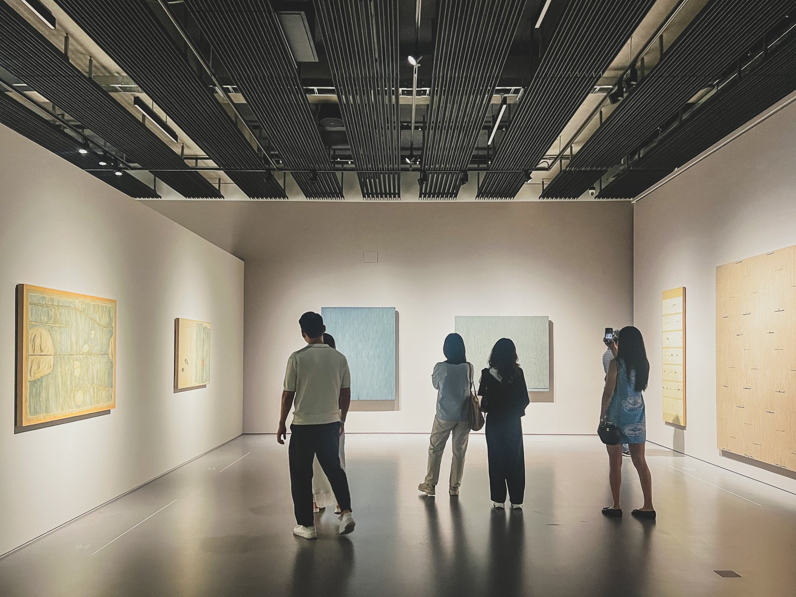 Visitors gathered in front of the color hanji works on Space 2's busiest wall, opening weekend
