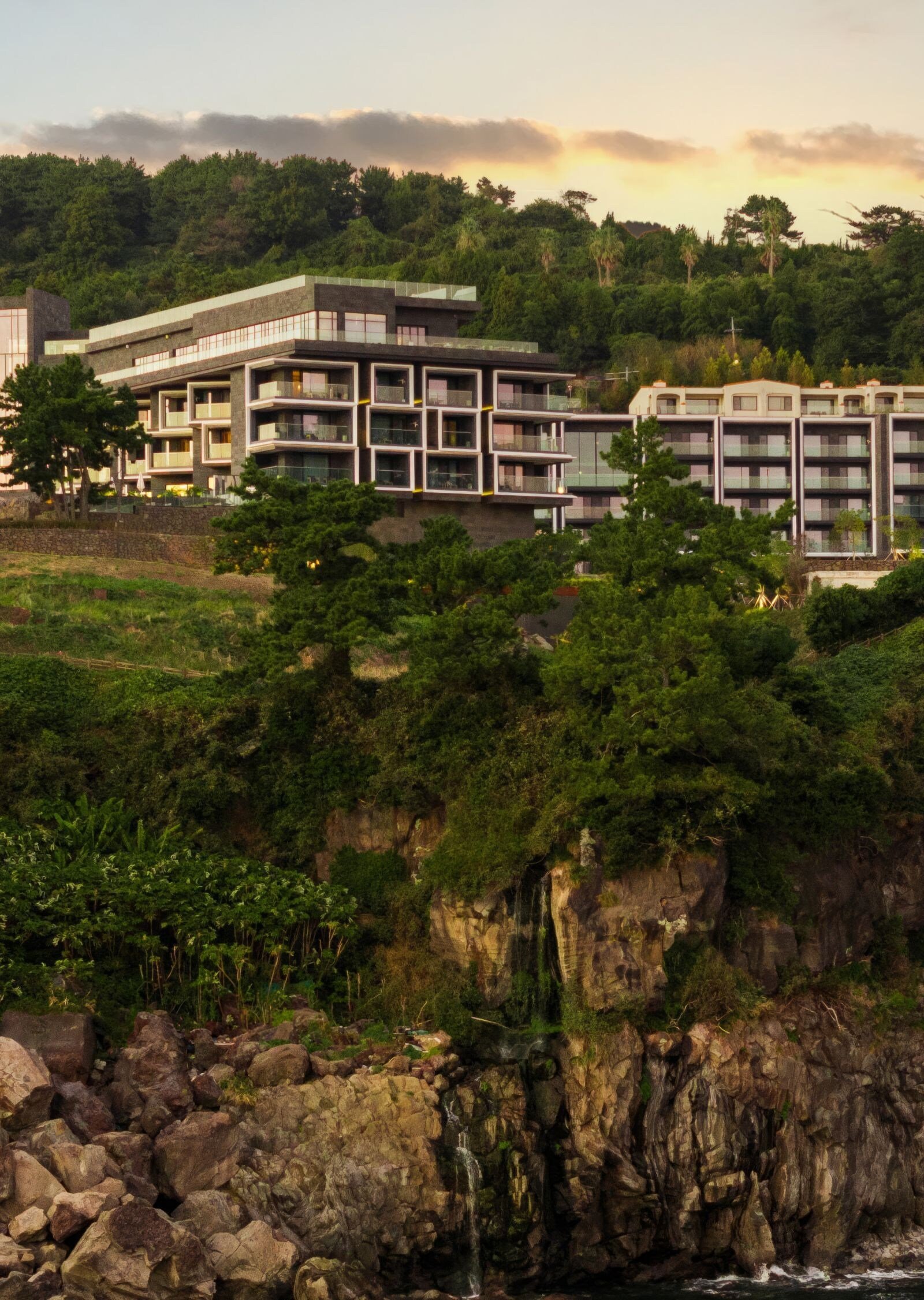 JW Marriott Jeju Resort & Spa clifftop exterior overlooking the coastline. Credit: JW Marriott Jeju official site