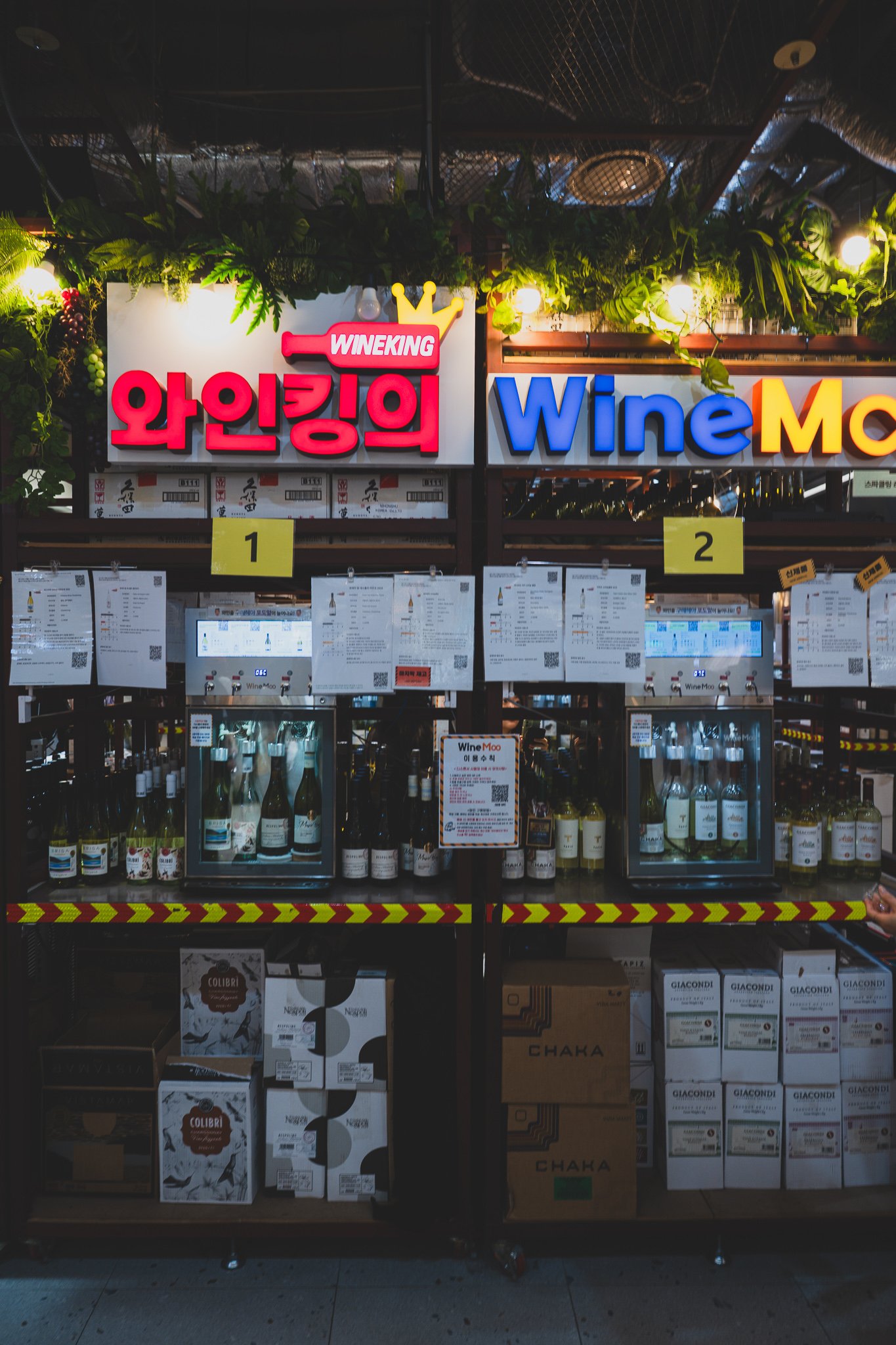 The entrance to WineMoo, with a row of numbered self-service wine tasting machines