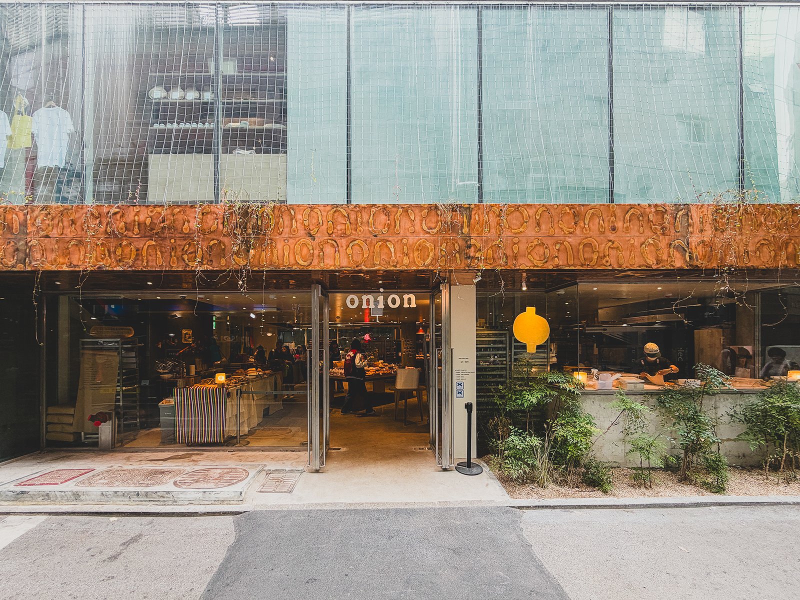 Onion Myeongdong exterior with teal terracotta and glass facade