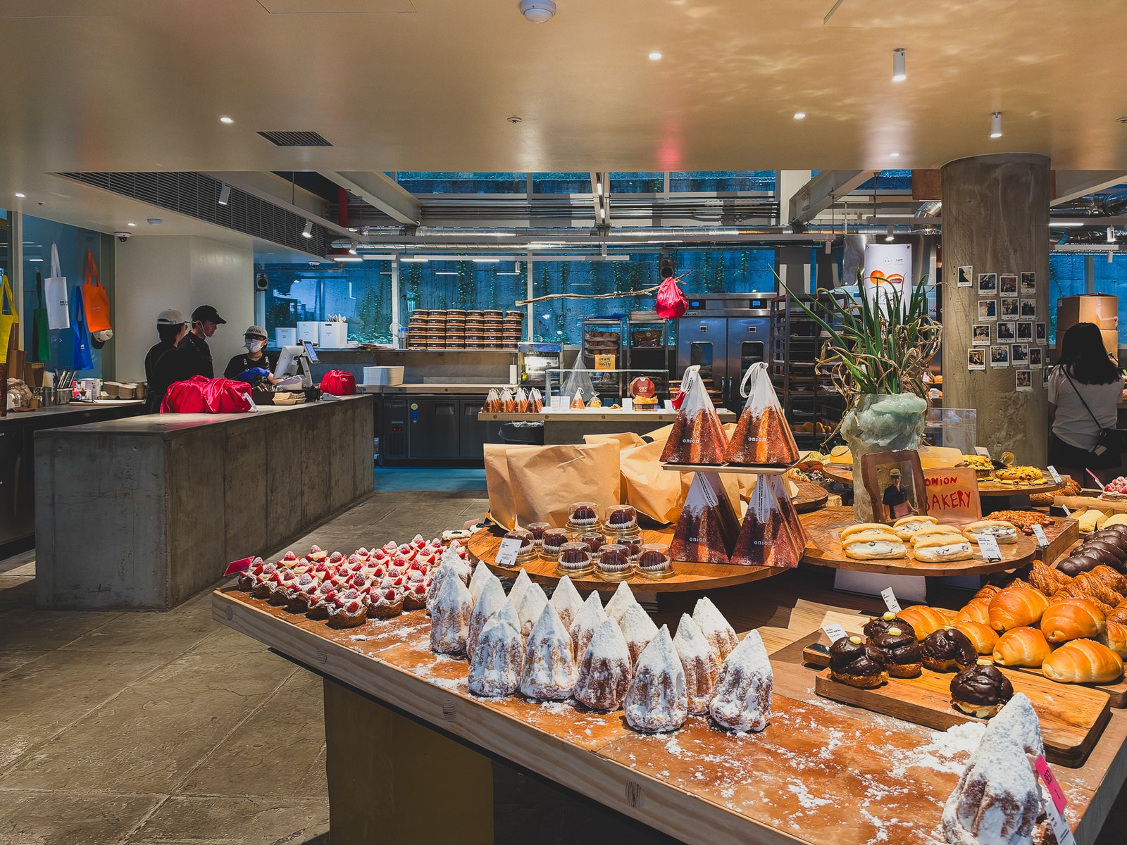 1st floor bakery display tables stacked with bread